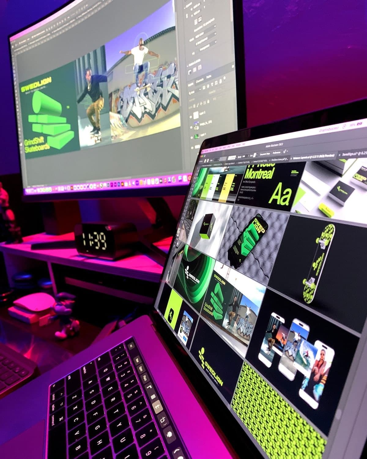 Brand artwork with bold green type on a laptop, in front of a monitor showing a skateboard visual