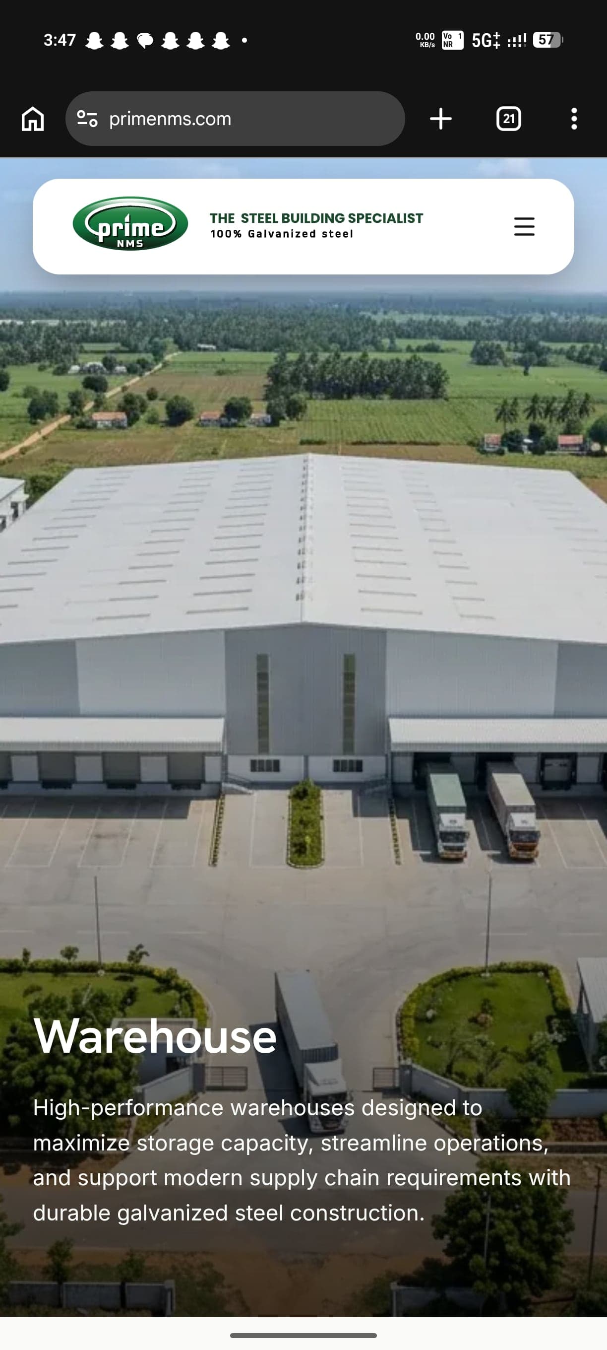 The PrimeNMS mobile home page: the logo bar over an aerial photo of a warehouse, captioned “Warehouse”