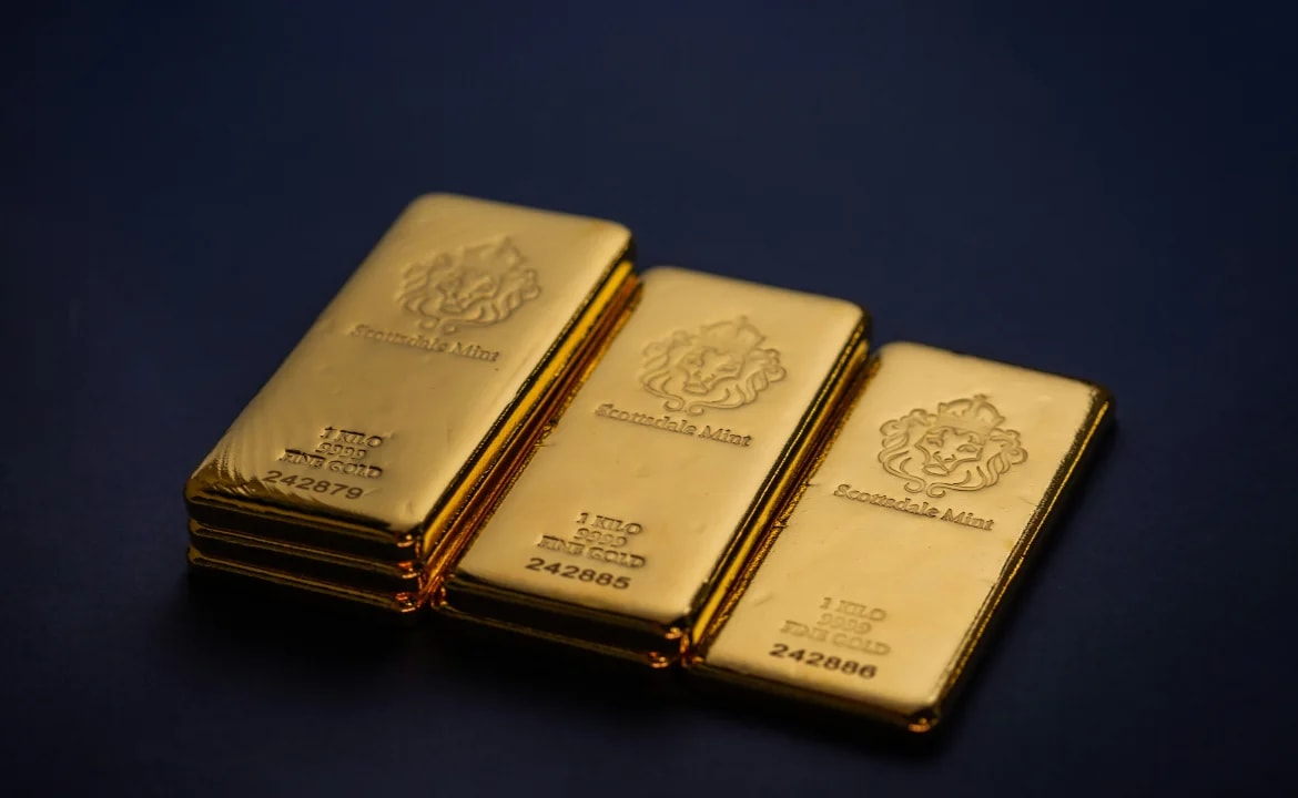 Three one-kilo gold bars