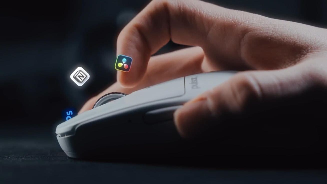 A hand on a slim mouse, with app icons floating beside it